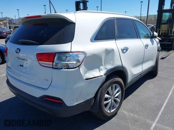 2018 Kia Sorento LX with VIN 5XYPG4A52JG354741, listed as a IAAI auction lot 41626561 with 91,242 mi miles and . Bid and sale history available at DreamBid. Image 4.