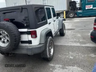 2013 Jeep Wrangler Unlimited Sport with VIN 1C4BJWDG6DL582321, listed as a Copart auction lot 61109125 with 182,953 mi miles and Clean title. Bid and sale history available at DreamBid. Image 4.