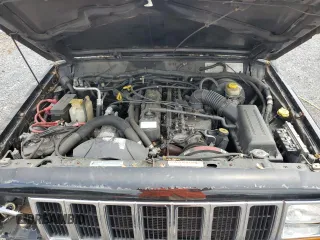 2000 Jeep Cherokee Classic with VIN 1J4FF58S8YL119611, listed as a Copart auction lot 57255685 with 148,908 mi miles and Clean title. Bid and sale history available at DreamBid. Image 12.