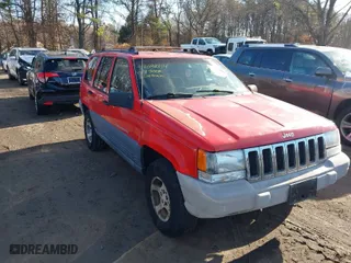 1997 Jeep Grand Cherokee Laredo with VIN 1J4GZ58S0VC550242, listed as a IAAI auction lot 41032114 with 185,307 mi miles. Bid and sale history available at carsss.com. Image 1.