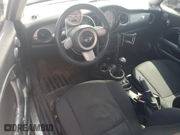 2005 MINI Hardtop with VIN WMWRC33585TK60334, listed as a Copart auction lot 65563635 with 122,758 mi miles and Clean title. Bid and sale history available at DreamBid. Image 8.