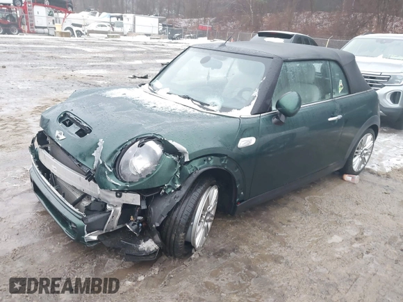 2017 MINI Convertible Cooper S z VIN WMWWG9C38H3C81071, wystawiony jako IAAI lot #41522738 z przebiegiem 59 040 mil mil oraz . Historia ofert i sprzedaży dostępna na DreamBid. Obrazek 2.