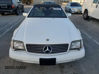 1997 Mercedes-Benz SL-Class with VIN WDBFA63F5VF143197, listed as a Copart auction lot 45003735 with 100,250 mi miles and Salvage Title. Bid and sale history available at carsss.com. Image 5.