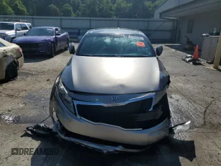 2013 Kia Optima EX z VIN 5XXGN4A73DG228548, wystawiony jako Copart lot #62209395 z przebiegiem 142 692 mil mil oraz Szkoda całkowita • Salvage title. Historia ofert i sprzedaży dostępna na DreamBid. Obrazek 5.