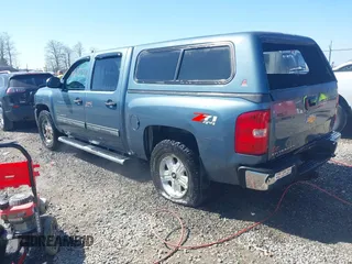 2013 Chevrolet Silverado 1500 LT with VIN 3GCPKSE77DG172991, listed as a IAAI auction lot 41631530 with 155,839 mi miles. Bid and sale history available at carsss.com. Image 3.