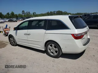 2013 Honda Odyssey Touring with VIN 5FNRL5H94DB021388, listed as a Copart auction lot 52582775 with 141,566 mi miles and Salvage Title. Bid and sale history available at carsss.com. Image 2.