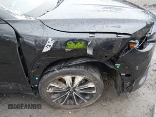 2024 Mazda CX-50 Premium z VIN 7MMVABDYXRN180263, wystawiony jako IAAI lot #41738791 z przebiegiem 9 688 mil mil oraz . Historia ofert i sprzedaży dostępna na DreamBid. Obrazek 19.