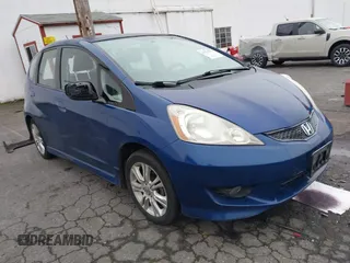 2009 Honda Fit Sport z VIN JHMGE87679S044439, wystawiony jako IAAI lot #41338173 z przebiegiem 78 234 mil mil oraz . Historia ofert i sprzedaży dostępna na DreamBid. Obrazek 1.