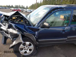 2004 Mazda Tribute LX with VIN 4F2CZ94114KM12271, listed as a IAAI auction lot 41955165 with Not Provided miles and . Bid and sale history available at carsss.com. Image 11.