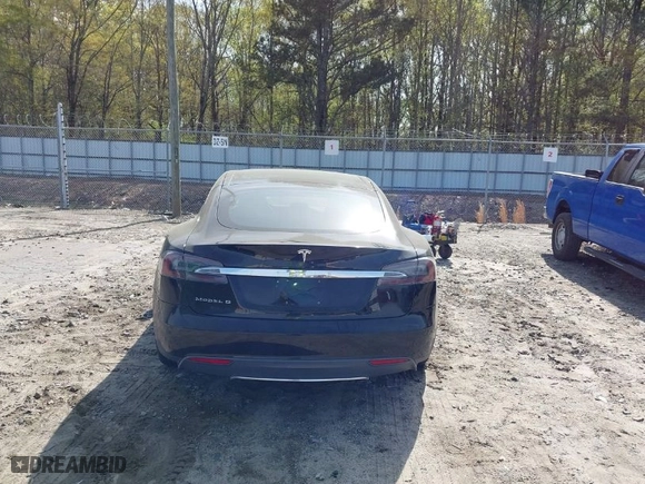 2015 Tesla Model S 85 kWh Battery with VIN 5YJSA1S11FFP79033, listed as a IAAI auction lot 41924740 with NaN miles. Bid and sale history available at carsss.com. Image 17.