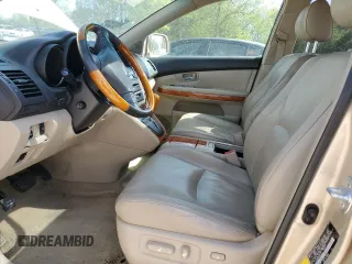 2008 Lexus RX 400h with VIN JTJGW31UX82007745, listed as a Copart auction lot 52857445 with 159,062 mi miles and Salvage Title. Bid and sale history available at DreamBid. Image 7.