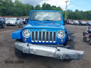2015 Jeep Wrangler Unlimited Sahara with VIN 1C4BJWEG4FL677879, listed as a IAAI auction lot 42676097 with 85,821 mi miles and . Bid and sale history available at DreamBid. Image 12.