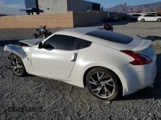 2014 Nissan 370Z Touring with VIN JN1AZ4EH7EM637101, listed as a Copart auction lot 41339705 with 105,841 mi miles and Salvage Title. Bid and sale history available at carsss.com. Image 2.