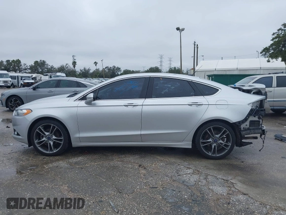 2015 Ford Fusion Titanium with VIN 3FA6P0K94FR120318, listed as a IAAI auction lot 41380325 with 137,910 mi miles. Bid and sale history available at carsss.com. Image 15.