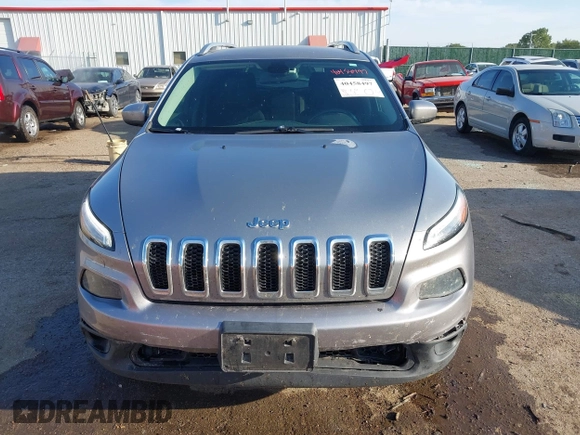 2016 Jeep Cherokee Latitude with VIN 1C4PJMCB5GW218166, listed as a IAAI auction lot 40458497 with 145,272 mi miles and . Bid and sale history available at carsss.com. Image 12.