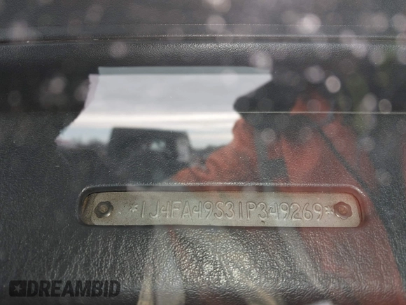 2001 Jeep Wrangler Sport z VIN 1J4FA49S31P349269, wystawiony jako IAAI lot #41427014 z przebiegiem 112 421 mil mil oraz . Historia ofert i sprzedaży dostępna na DreamBid. Obrazek 9.