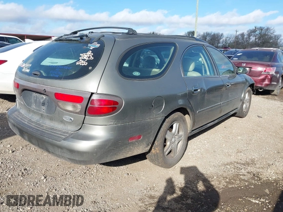 2002 Ford Taurus z VIN 1FAHP59SX2G137396, wystawiony jako IAAI lot #41661425 z przebiegiem 155 789 mil mil oraz . Historia ofert i sprzedaży dostępna na DreamBid. Obrazek 4.