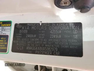 2010 Kia Optima LX z VIN KNAGG4A8XA5382979, wystawiony jako Copart lot #57067065 z przebiegiem 104 611 mil mil oraz Szkoda całkowita • Salvage title. Historia ofert i sprzedaży dostępna na DreamBid. Obrazek 12.