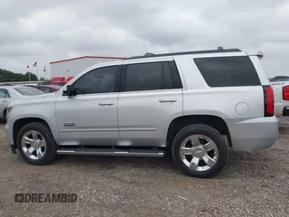 2019 Chevrolet Tahoe LT z VIN 1GNSCBKC1KR191789, wystawiony jako IAAI lot #42144961 z przebiegiem 94 178 mil mil oraz . Historia ofert i sprzedaży dostępna na DreamBid. Obrazek 14.