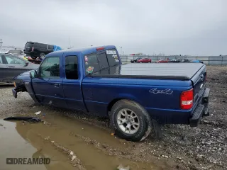 2010 Ford Ranger XLT with VIN 1FTLR4FE3APA70565, listed as a Copart auction lot 52052535 with 155,577 mi miles and Salvage Title. Bid and sale history available at carsss.com. Image 2.