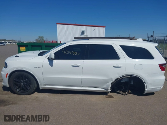 2021 Dodge Durango R/T with VIN 1C4SDJCT5MC520580, listed as a IAAI auction lot 42147987 with 104,430 mi miles and . Bid and sale history available at DreamBid. Image 14.