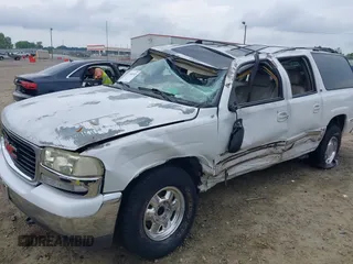 2002 GMC Yukon XL SLT z VIN 1GKEC16Z42J136352, wystawiony jako IAAI lot #42300333 z przebiegiem 212 362 mil mil oraz . Historia ofert i sprzedaży dostępna na DreamBid. Obrazek 6.