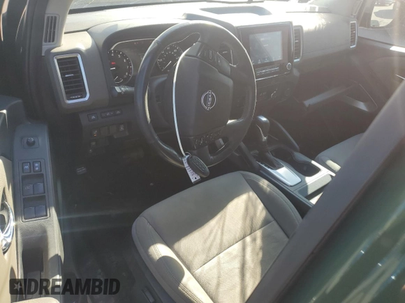 2022 Nissan Frontier Pro-X with VIN 1N6ED1EJ3NN604795, listed as a Copart auction lot 88792115 with 62,856 mi miles and Salvage title. Bid and sale history available at DreamBid. Image 7.