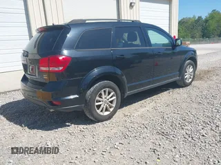 2015 Dodge Journey SXT with VIN 3C4PDCBG2FT560953, listed as a IAAI auction lot 42053264 with 127,463 mi miles and . Bid and sale history available at DreamBid. Image 4.