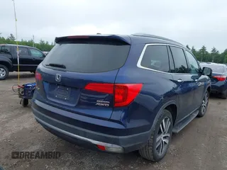 2017 Honda Pilot Touring with VIN 5FNYF6H99HB093136, listed as a IAAI auction lot 42507326 with 125,579 mi miles and . Bid and sale history available at DreamBid. Image 4.