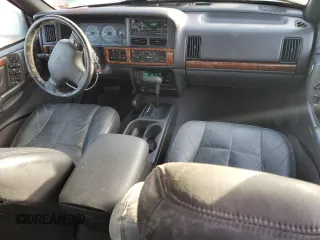 1998 Jeep Grand Cherokee Limited with VIN 1J4GZ78S0WC138917, listed as a Copart auction lot 86223974 with 152,482 mi miles and Clean Title. Bid and sale history available at carsss.com. Image 8.