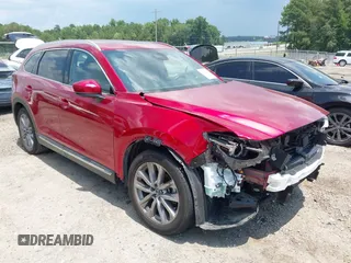 2021 Mazda CX-9 Grand Touring with VIN JM3TCADY0M0522392, listed as a IAAI auction lot 42614926 with 72,885 mi miles and . Bid and sale history available at DreamBid. Image 1.