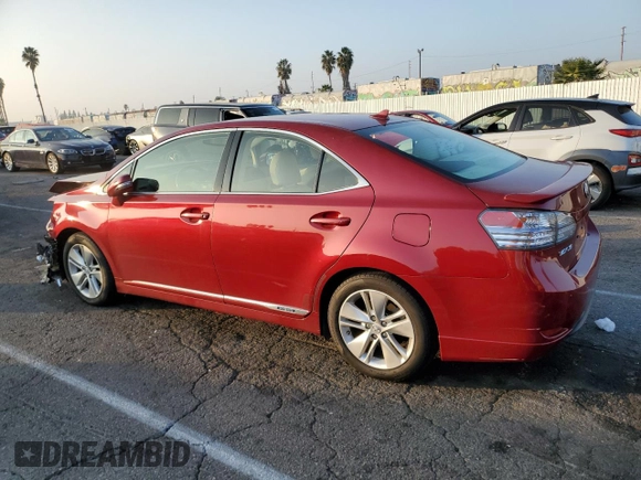 2010 Lexus HS 250h with VIN JTHBB1BA3A2024716, listed as a Copart auction lot 83153184 with 101,598 mi miles and Salvage Title. Bid and sale history available at DreamBid. Image 2.