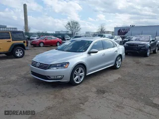 2012 Volkswagen Passat SE w/Sunroof with VIN 1VWBM7A32CC100678, listed as a IAAI auction lot 41925484 with 154,373 mi miles. Bid and sale history available at carsss.com. Image 2.