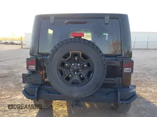 2013 Jeep Wrangler Sahara with VIN 1C4AJWBG8DL565227, listed as a IAAI auction lot 41987087 with 90,644 mi miles and . Bid and sale history available at DreamBid. Image 17.
