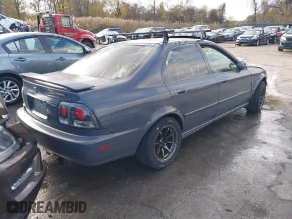 1997 Honda Accord EX with VIN 1HGCD565XVA049579, listed as a IAAI auction lot 40867933 with 189,191 mi miles and . Bid and sale history available at DreamBid. Image 4.