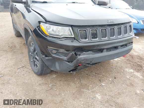 2019 Jeep Compass Trailhawk z VIN 3C4NJDDB5KT618149, wystawiony jako IAAI lot #41959320 z przebiegiem 99 795 mil mil oraz . Historia ofert i sprzedaży dostępna na DreamBid. Obrazek 6.
