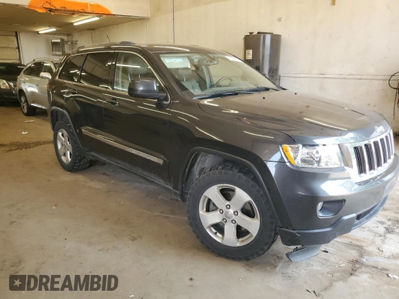 2011 Jeep Grand Cherokee Laredo with VIN 1J4RR4GG6BC641138, listed as a Copart auction lot 60209955 with 218,235 mi miles and Clean title. Bid and sale history available at DreamBid. Image 4.