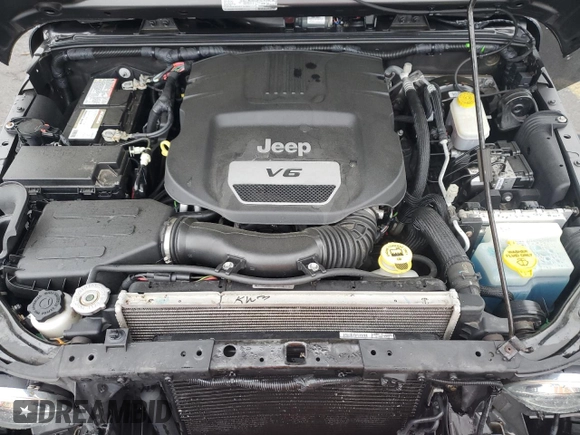 2017 Jeep Wrangler Sport z VIN 1C4AJWAG0HL644978, wystawiony jako Copart lot #56485985 z przebiegiem 104 151 mil mil oraz Szkoda całkowita • Salvage title. Historia ofert i sprzedaży dostępna na DreamBid. Obrazek 11.