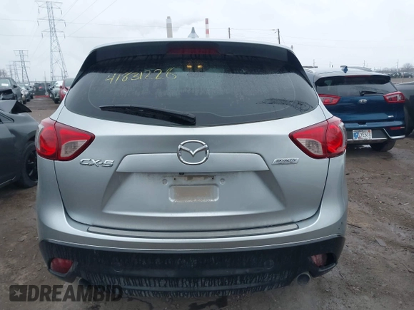 2016 Mazda CX-5 Sport with VIN JM3KE2BY5G0647715, listed as a IAAI auction lot 41831228 with 89,689 mi miles and . Bid and sale history available at DreamBid. Image 16.