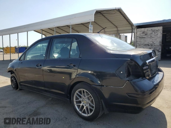 2010 Nissan Versa S z VIN 3N1BC1AP5AL360227, wystawiony jako Copart lot #55966485 z przebiegiem 197 936 mil mil oraz Szkoda całkowita • Salvage title. Historia ofert i sprzedaży dostępna na DreamBid. Obrazek 2.