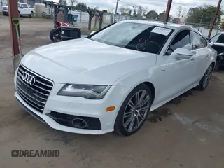 2014 Audi A7 3.0 Prestige with VIN WAU2GAFC7EN059419, listed as a IAAI auction lot 41702771 with 134,474 mi miles. Bid and sale history available at carsss.com. Image 2.
