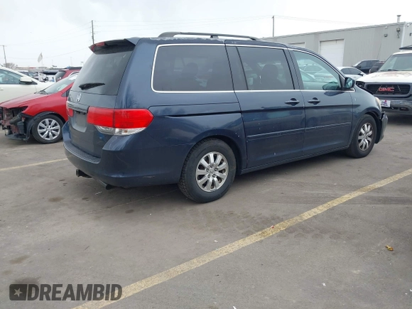 2010 Honda Odyssey EX-L with VIN 5FNRL3H68AB043450, listed as a IAAI auction lot 41912223 with 199,855 mi miles. Bid and sale history available at carsss.com. Image 4.