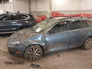 2014 Volkswagen Jetta SportWagen TDI w/Sunroof & Nav with VIN 3VWPL7AJ2EM627998, listed as a IAAI auction lot 41614718 with 134,203 mi miles. Bid and sale history available at carsss.com. Image 6.