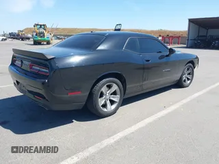 2016 Dodge Challenger SXT Plus z VIN 2C3CDZAG4GH184435, wystawiony jako IAAI lot #42162973 z przebiegiem 168 495 mil mil oraz . Historia ofert i sprzedaży dostępna na DreamBid. Obrazek 4.