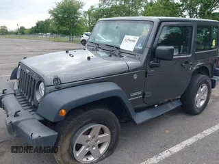 2016 Jeep Wrangler Willys Wheeler with VIN 1C4GJWAG2GL318981, listed as a IAAI auction lot 42390588 with 131,559 mi miles and . Bid and sale history available at DreamBid. Image 18.