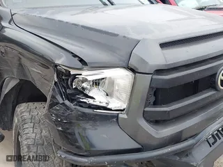 2014 Toyota Tundra 4WD Truck SR with VIN 5TFUM5F14EX051843, listed as a IAAI auction lot 41773983 with 145,089 mi miles. Bid and sale history available at carsss.com. Image 6.