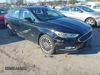 2017 Ford Fusion Titanium z VIN 3FA6P0SU2HR309895, wystawiony jako IAAI lot #40963527 z przebiegiem 80 761 mil mil oraz . Historia ofert i sprzedaży dostępna na DreamBid. Obrazek 1.
