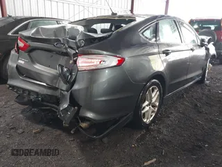 2015 Ford Fusion SE with VIN 1FA6P0H74F5105133, listed as a IAAI auction lot 41212659 with 186,378 mi miles. Bid and sale history available at carsss.com. Image 4.