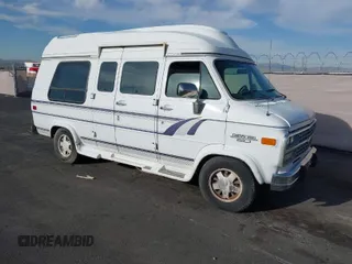 1995 Chevrolet Chevy Van z VIN 1GBEG25K5SF131291, wystawiony jako IAAI lot #41861888 z przebiegiem 90 365 mil mil oraz . Historia ofert i sprzedaży dostępna na DreamBid. Obrazek 1.