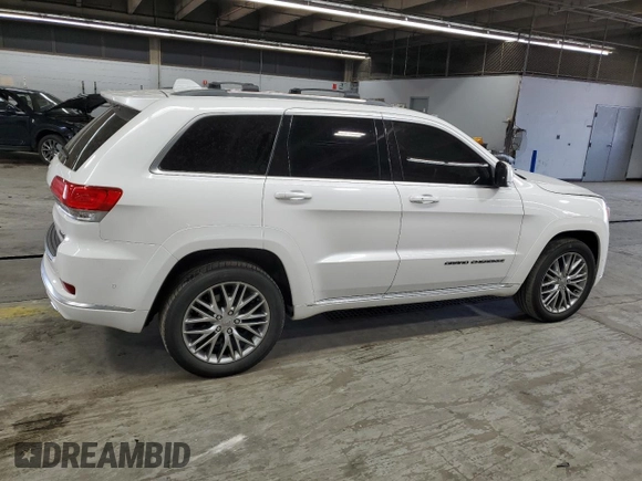 2018 Jeep Grand Cherokee Summit with VIN 1C4RJFJT5JC273869, listed as a Copart auction lot 57482865 with 70,843 mi miles and Salvage title. Bid and sale history available at DreamBid. Image 3.